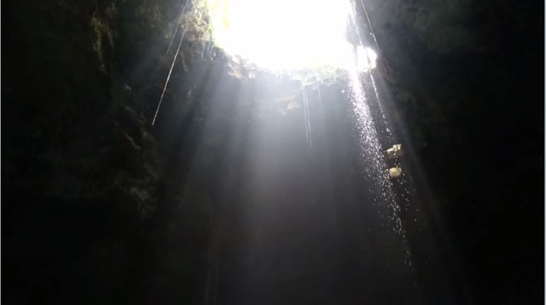 Cave with light shining from above